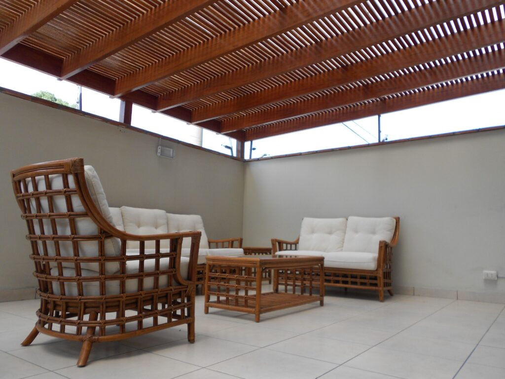 pexels photo 279867 279867 Stylish outdoor patio with rattan chairs and a wooden pergola, perfect for relaxation.