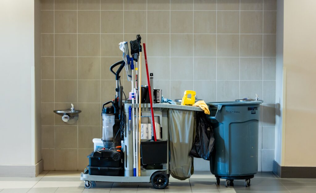 pexels photo 34516664 34516664 A comprehensive collection of professional cleaning tools on a cart in an indoor environment.